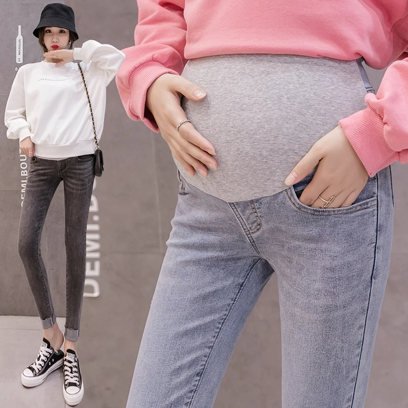 

Pregnant women jeans wear outside during the spring and autumn show thin abdomen pants feet pants tide mother cultivate one's mo