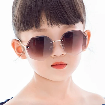 

Child Cute Small Round Rimless Frame Sunglasses Children Kids Gray Pink Red Lens Fashion Boys Girls UV400 Protection Eyewear