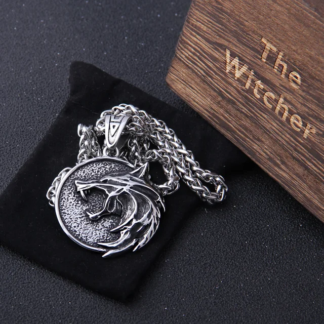 the Wizard wolf head pendant necklace for Geralt with a The Wild Hunt 3 Figure TV as photo show