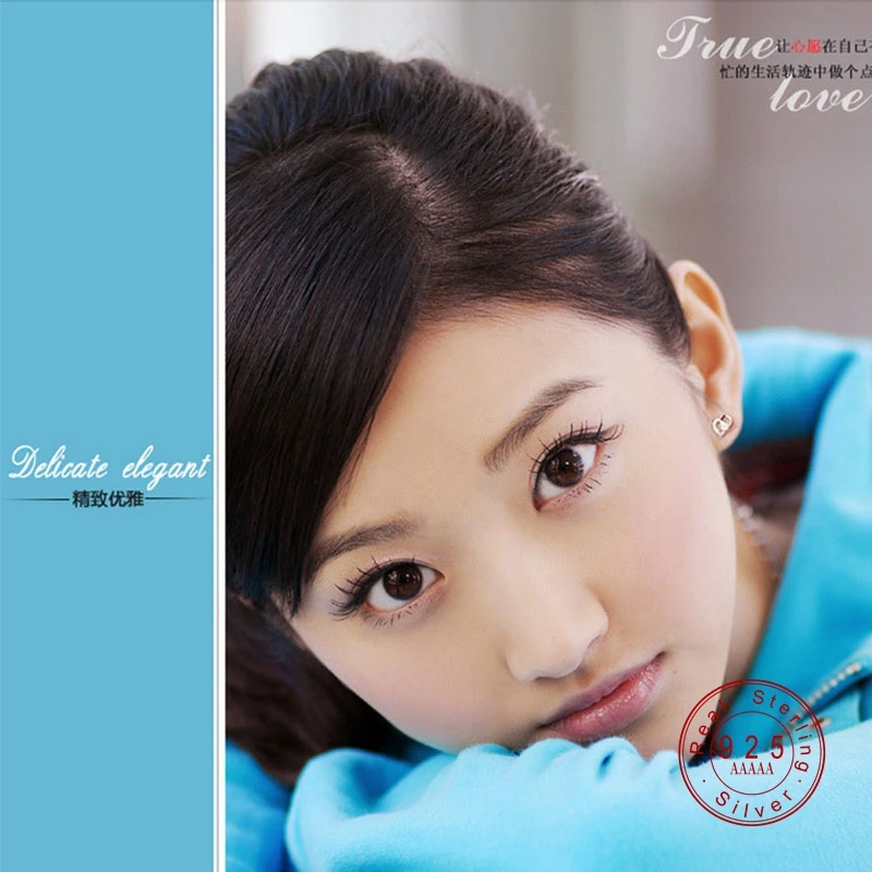 Женские серьги серебряного цвета вечерние с кубическим цирконием и кристаллом в