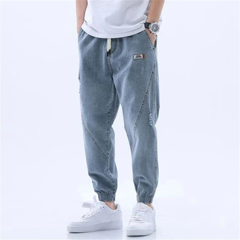 Pantalones vaqueros de moda para hombre, pantalón harén informal, cintura elástica, holgados, lavados, para primavera y otoño, novedad