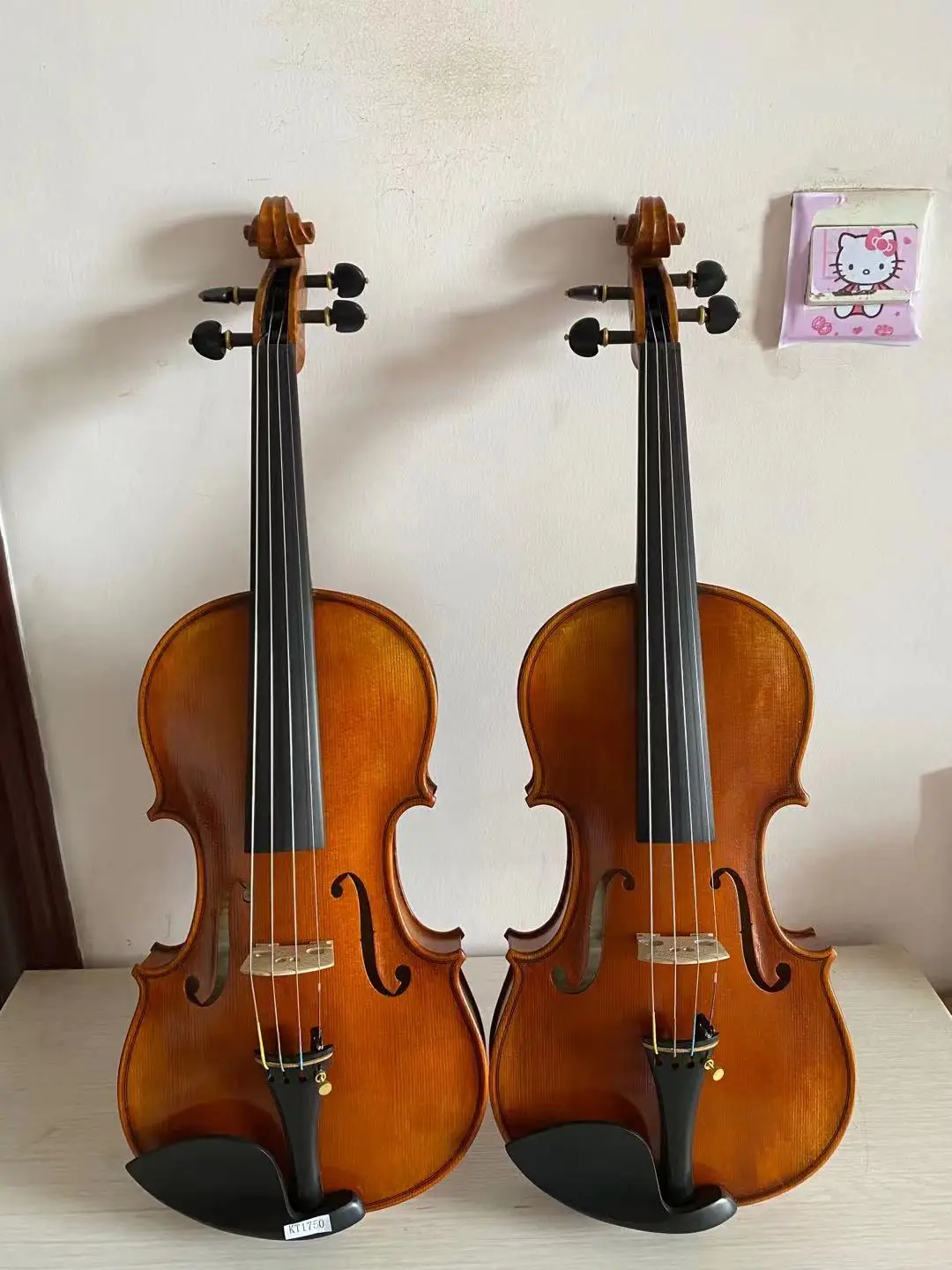TWO VIOLINS 4/4 size maple back with hand crabed words old spruce top