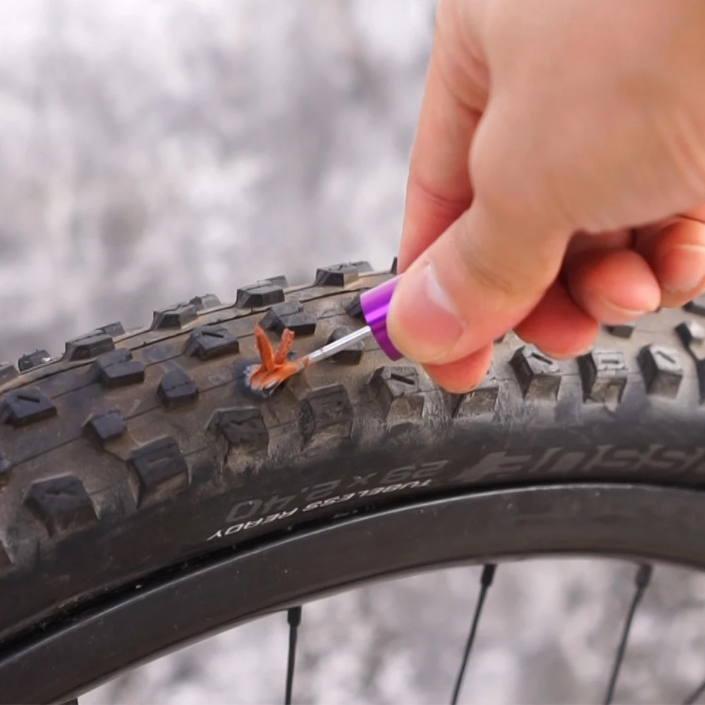 Outil de réparation de pneus de vélo léger bande de caoutchouc extrémité ou