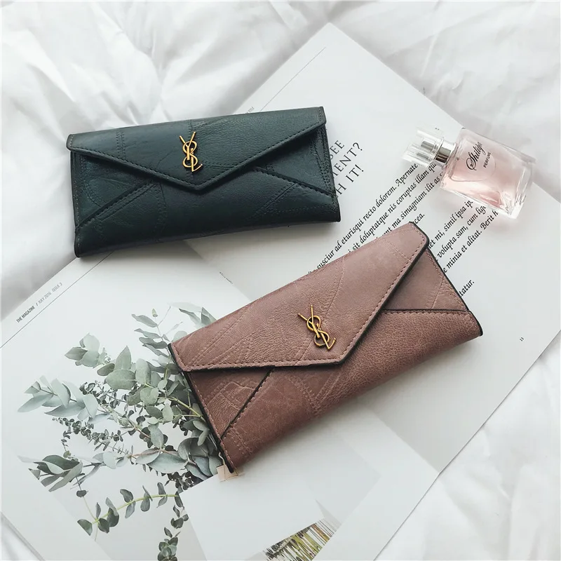 

New Korean version of the tide ladies wallet long tri-fold multi-function coin purse buckle multi-card change card package