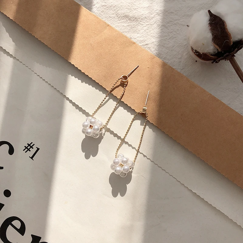 

UXN256 New style fresh temperament long pearl earrings suitable for round-faced women's Earrings