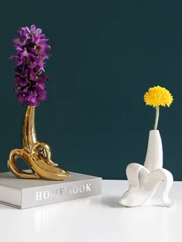 

CREATIVE CERAMIC DRY VASE DECORATION BANANA SHAPE MODERN MINIMALIST HOME DECORATION GOLD/WHITE BANANA VASE IS A UNIQUE ORNAMENT