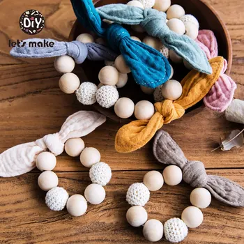

Let's Make Baby Teether Wooden Ring Feeding Bibs Cotton Crochet Beads Bow Bunny Rabbit Teether Bracelet 1PC Baby Teething Toys