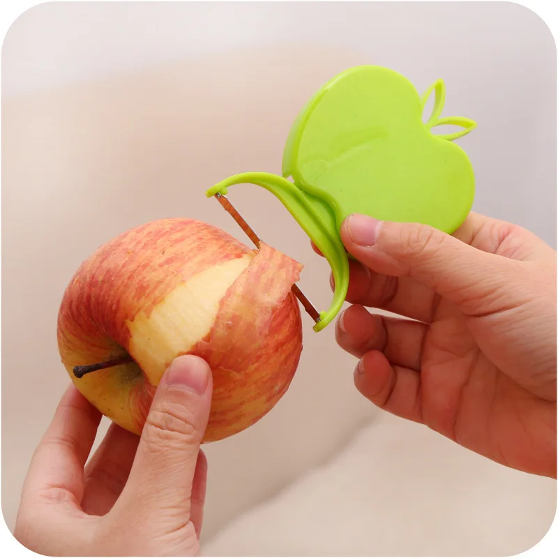 

Foldable Mini Cute Stainless Steel Folded Apple Shaped Fruit Peeler Kitchen Tools Hot Selling Kitchen Helper Hot Selling