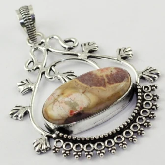 

Maxican Bird Eye Pendant Silver Overlay over Copper ,63 mm, P1685