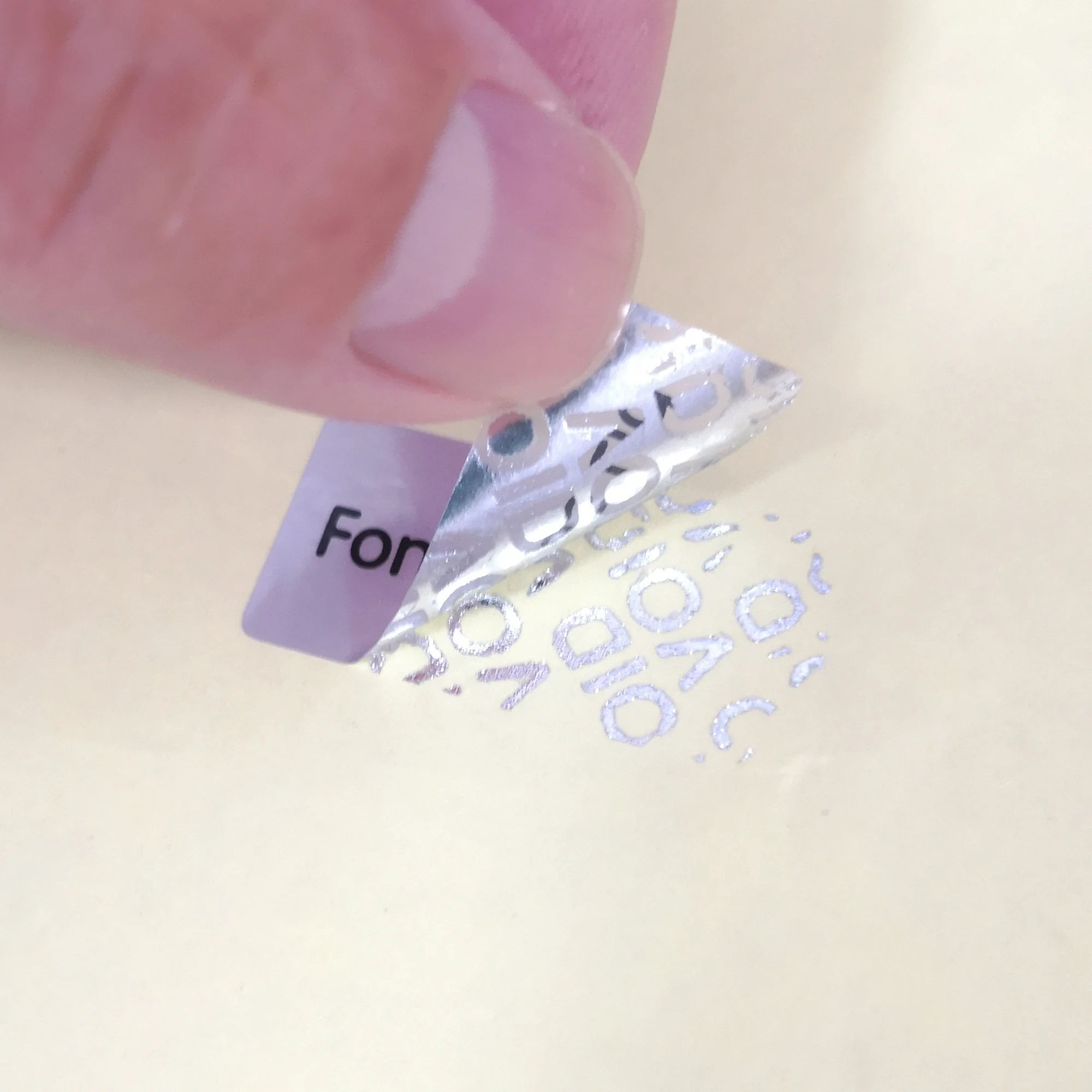 

Custom order silver color VOID left after peel off, warranty void evident, Item No. CU77