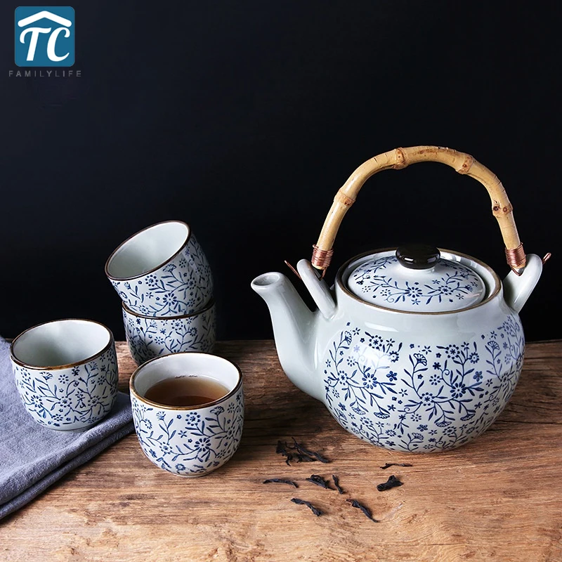 Una pentola e quattro tazze teiera Fine Bone China Set da tè Home