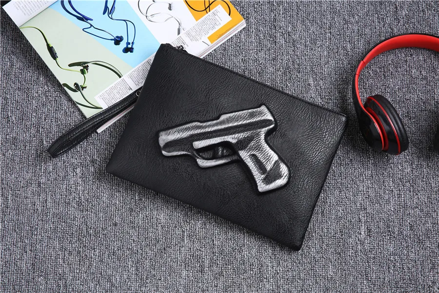 Personality pattern three-dimensional street leather wrist bag Korean version of fashionable men's hand bag