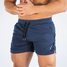 Pantalones cortos de moda para hombre, Shorts ligeros para correr, gimnasio, Fitness, tejido elástico de secado rápido, envío directo