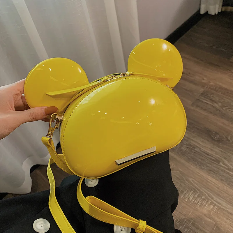 

2019 new Korean version of the bright side slanted bag tide 100 fashion lacquer leather single shoulder Mitch girl bag