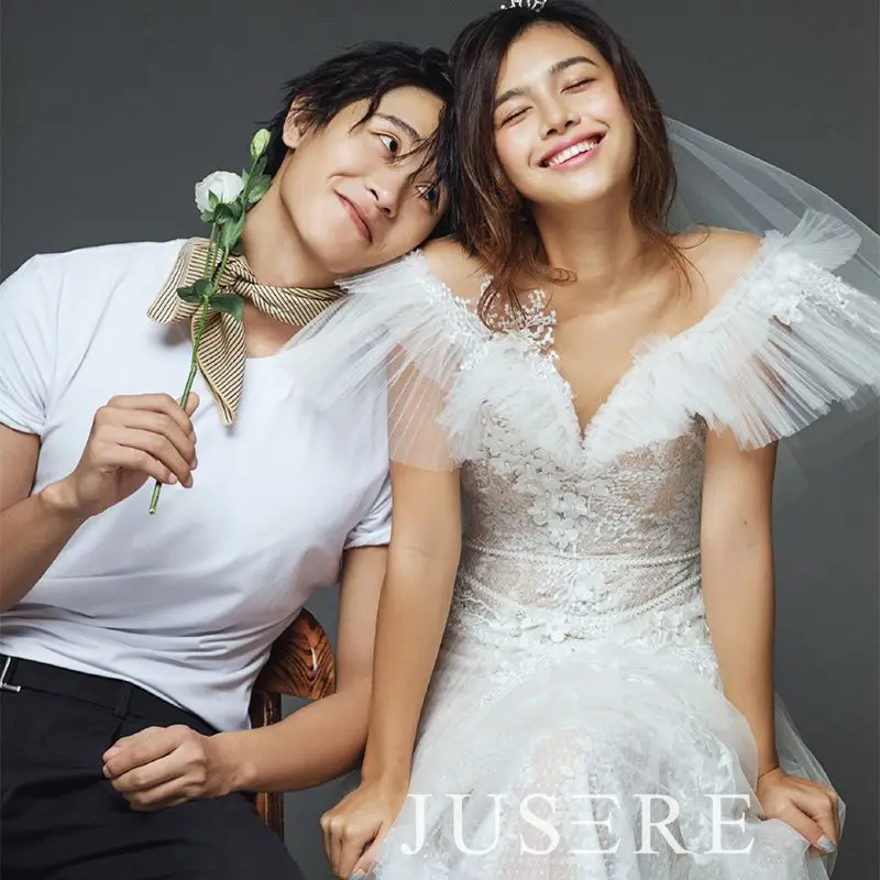 Ivory color A-Line scoop neckline short sleeves appliques beading pleated sweep train wedding dress