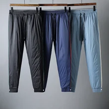 JSBD warm fashion not puffy thick warm down cotton padded men slim feet casual pants wear cotton pants