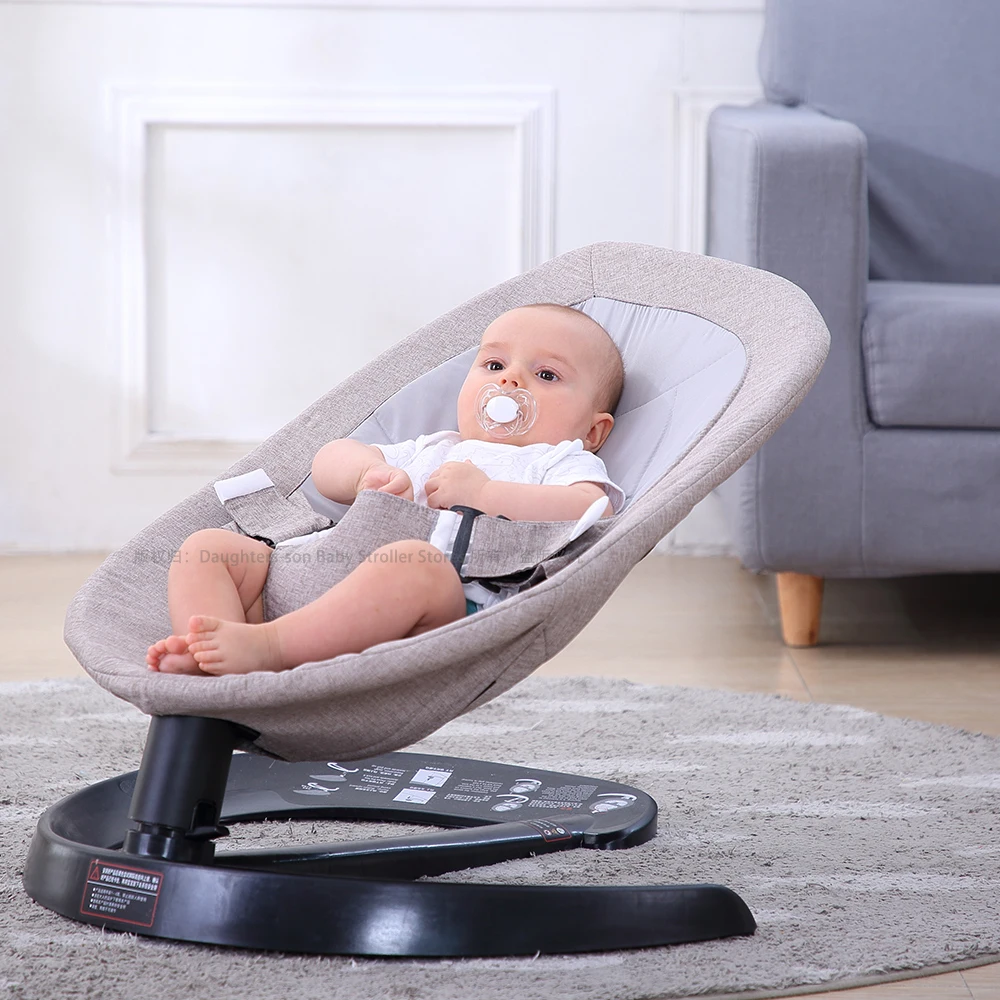infant sleeping in bouncer