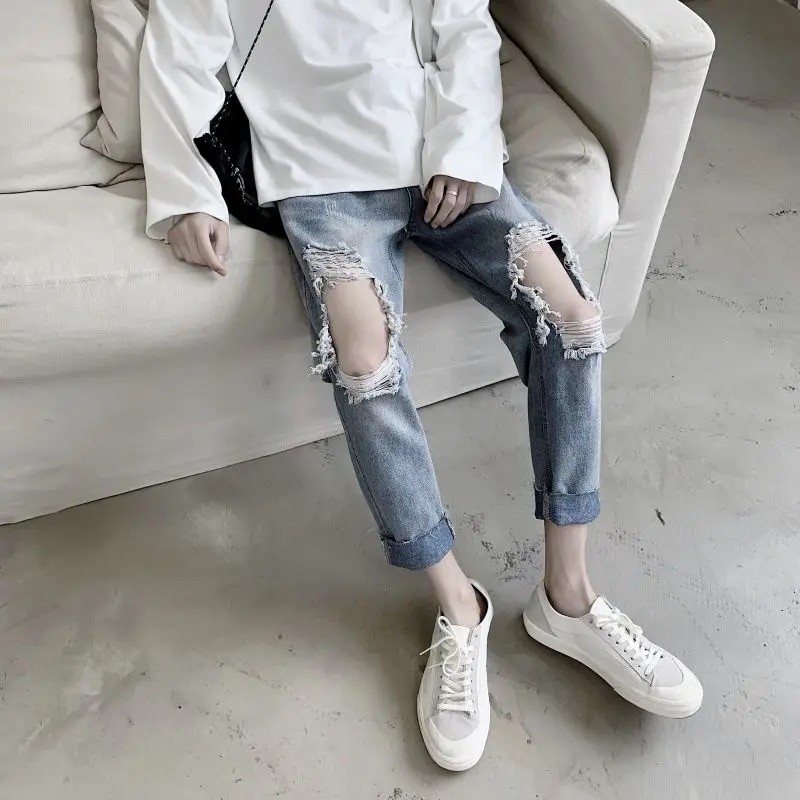 

Men's jeans 2020 spring and summer new solid color hole nine points jeans young personality fashion trend men's clothing