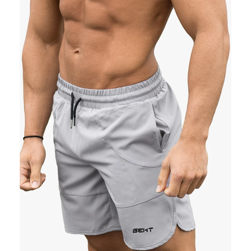 Брендовые мужские спортивные свободные шорты для фитнеса, бодибилдинга, бегунов, летние быстросохнущие крутые короткие штаны, мужские повседневные пляжные Брендовые спортивные штаны - Цвет: Light grey 1