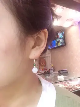 

Spike: A variety of natural Russian, white jade earrings. 14k gold.The quality is visible as shown. Multiple colors, optional.