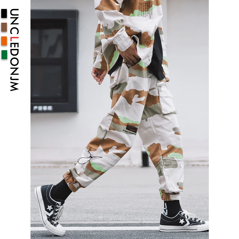

UNCLEDONJM Man Pants New Fashion Streetwear Stitching Color Joggers Hip Hop Long Pants Men Elastic Waist Cargo Pants Men 16 Pick