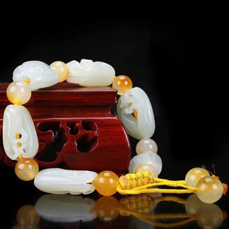

Xinjiang Natural Hetian Jade Hollow out Fu Melon Bracelets Light Greenish White Jade Hollow out Fu Melon Elastic Bracelets Men A