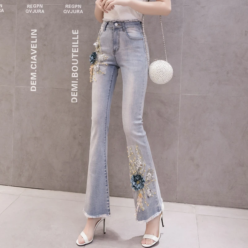 

2022 High Waist Jeans Women Pearl Embroidery 3D Flower Appliques Irregular Elastic Denim Trousers Woman Flare Pants