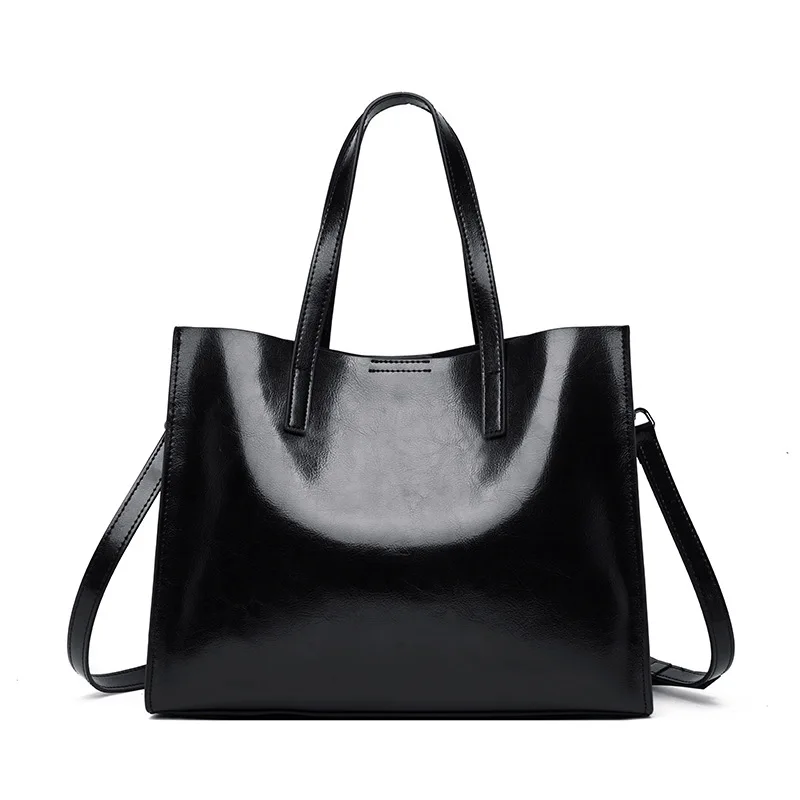 

Women's bag new tide large capacity first layer cowhide solid color single shoulder slung big bag female leather ladies handbag