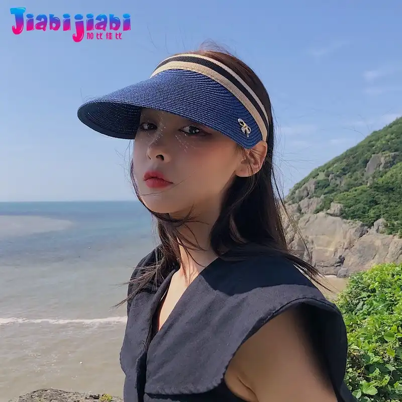 women in baseball hats