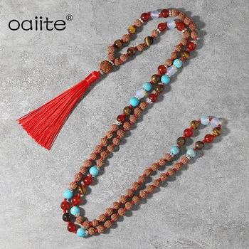 

OAIITE Meditation Mala Rudraksha Necklace with 108 Beads 8mm Natural Stone Knotted Long Tassel Strand Necklace for Women or Men