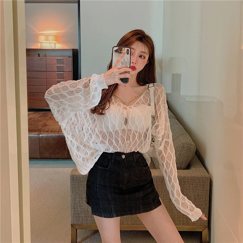 

New sexy hollow flower fairy loose chain long sleeve knitted top