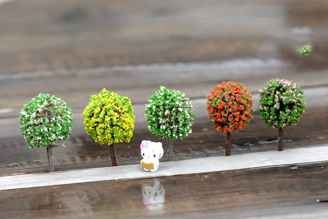 Create a whimsical fairy garden with 100PCS Fairy Garden Miniature Trees.