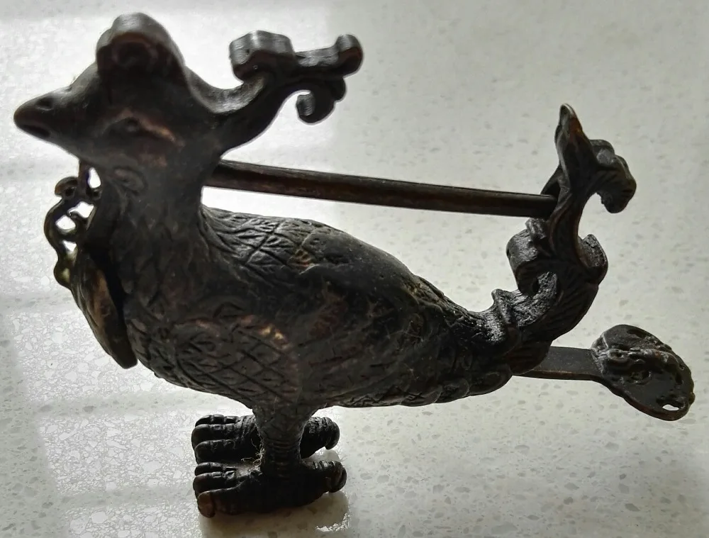 

Collection of animal bird sculpture in ancient cabinet door lock