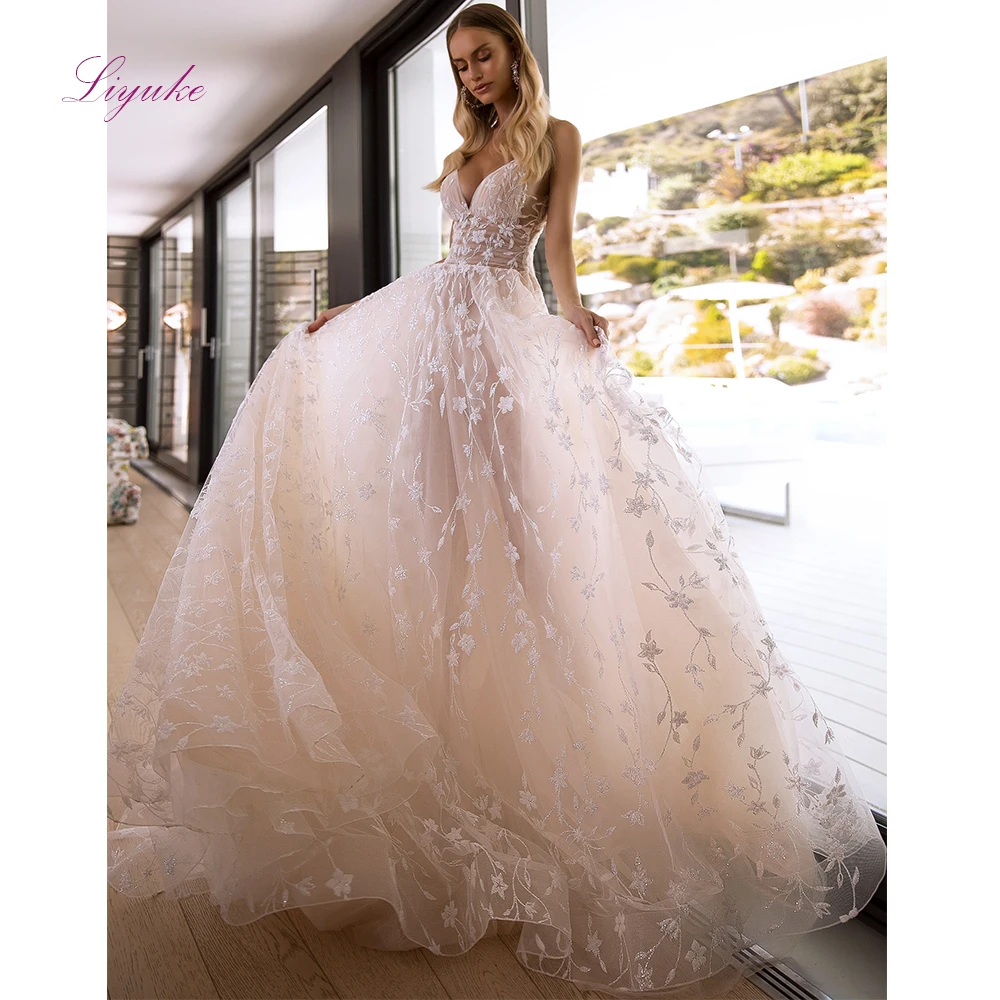 Liyuke Beach Wedding Dress Lace Flower Appliques Spaghetti Straps Sexy Illusion Pink Tulle Backless Zipper Chapel Train