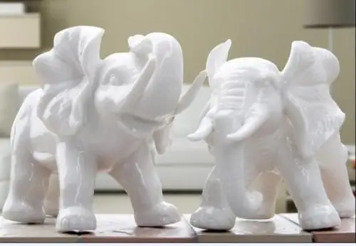 

Chinese White Ceramic Elephant Blessing And Good Luck Gift Animal Statue A Pair