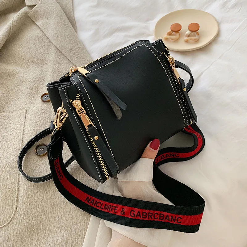 

Bag female 2019 autumn tide Korean version of the wide shoulder strap shoulder color bucket bag wild personality Messenger bag