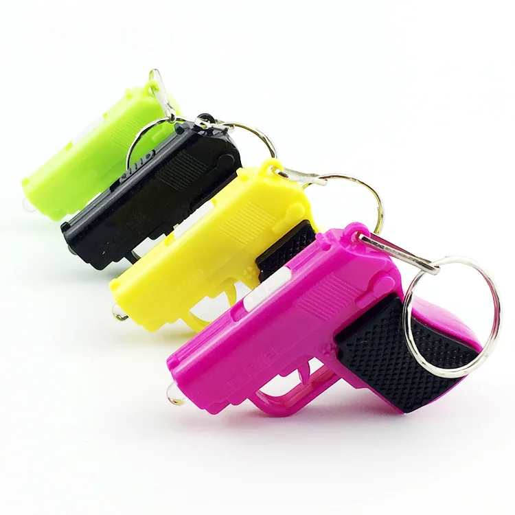 FREE SHIPPING BY DHL 100pcs/lot New Plastic LED Gun Keychains Mini Gun Shaped Keyrings with Flashlight for Gifts