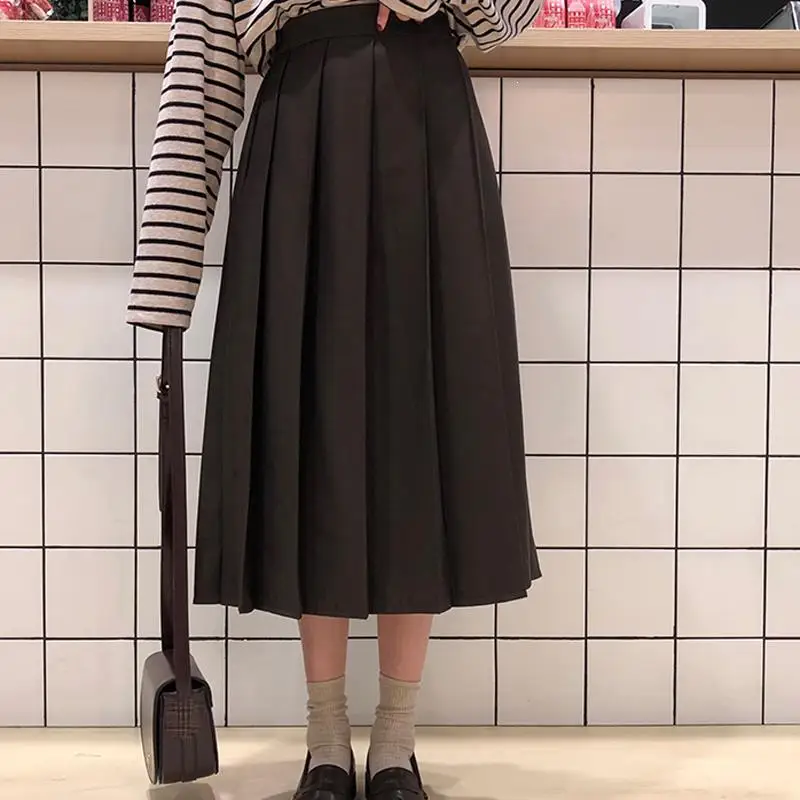 Новые Женские однотонные плиссированные юбки, повседневные юбки трапециевидной формы с высокой талией, корейские студенческие осенние юбки в консервативном стиле