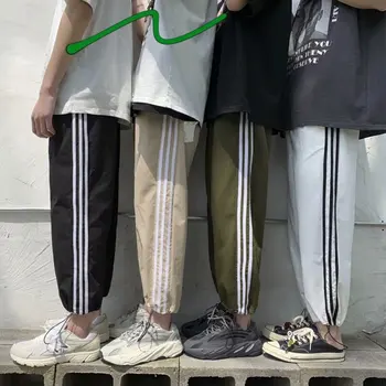 

Three line sports pants super fire cec pants men straight loose summer thin section nine points tide brand ins beam foot leisure