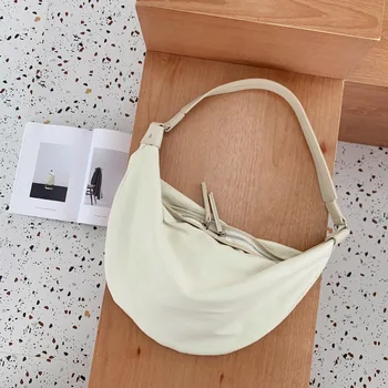 

Canvas bag female Hong Kong style simple fashion large capacity Japanese small shoulder female shoulder oblique cross dumpling