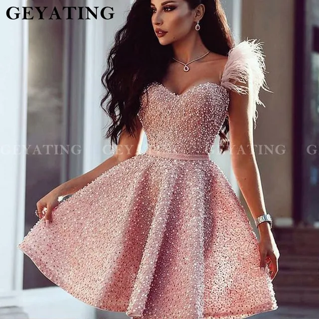 sparkly dress with feathers