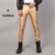 Drop shipping Бренд Мужские кожаные Брюки Slim Fit Эластичный Стиль Мода ИСКУССТВЕННАЯ кожа Брюки Мотоциклетные Брюки Уличная Одежда Теплый флис