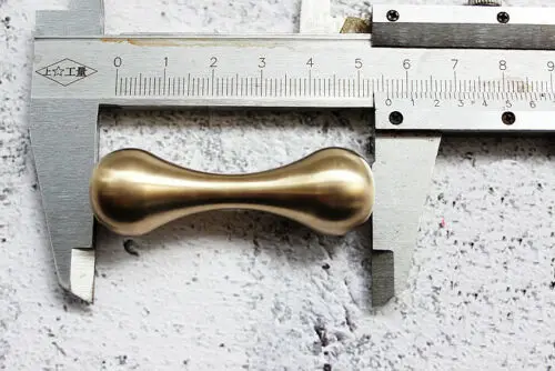 

1x Brass Knucklebone Fidget Toy Worry Beads Finger Skill Paracord Stress