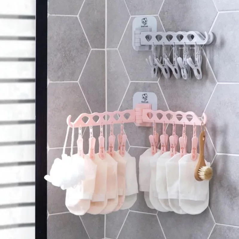 

One monkey Household wall hangers Travel portable folding drying rack plastic creative clothes rack hangers for hanging bathroom
