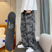 Pantalones vaqueros de pierna ancha estampados para hombre y mujer, jeans sueltos rectos para monopatín, pantalones informales de Hip Hop, otoño e invierno, 2021