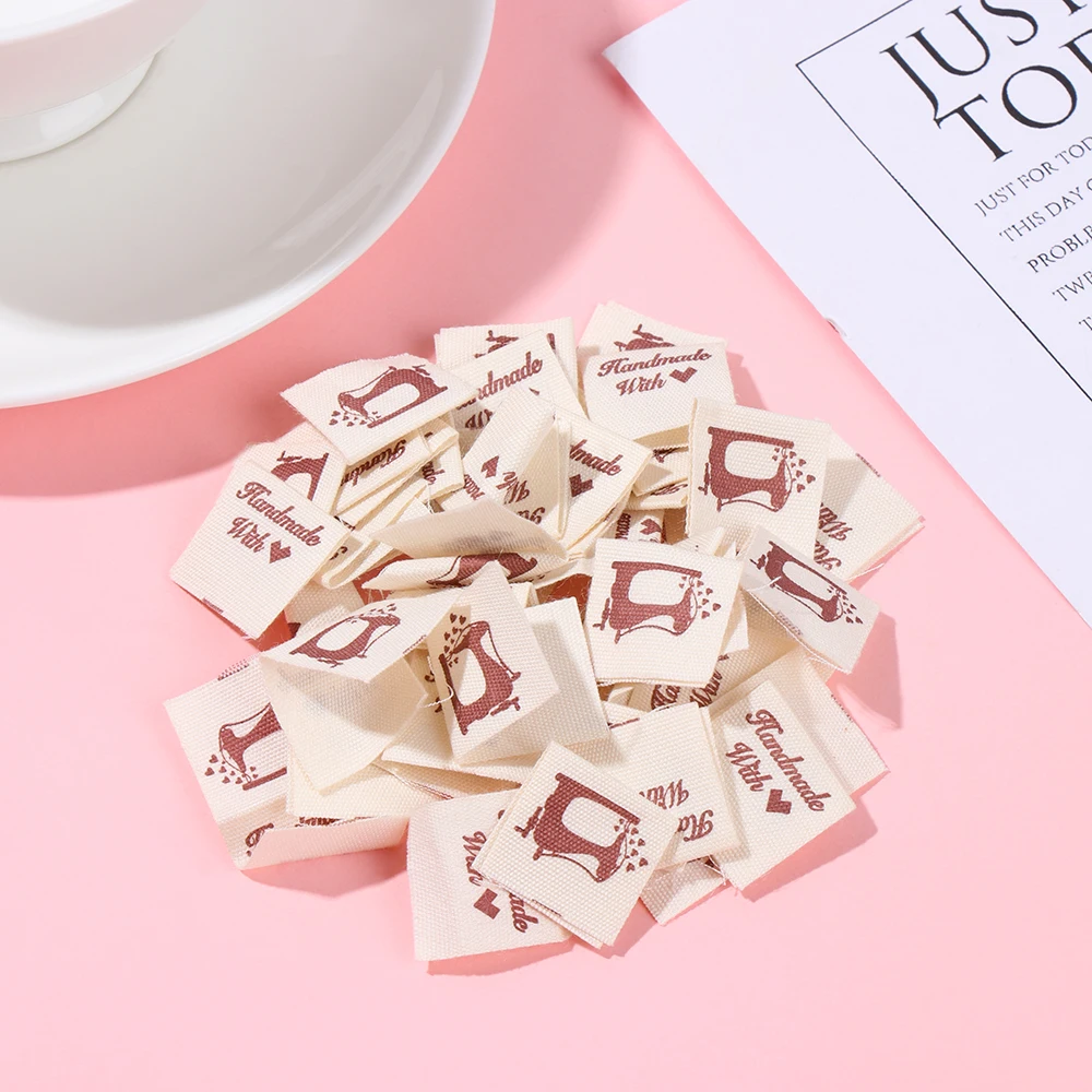 50PCS Handmade With Love Cloth Garment Labels Cartoon Cat Woven Knitted Supplies Heart Pattern Clothing Tags Sewing Accessories