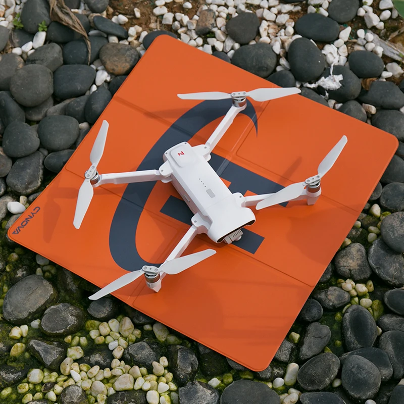 thumbnail image 2 of Drone Helipad LKTOP Weighted Foldable Drone Landing Pad For DJI/Specta Drone, Double-Sided Waterproof Helipad Landing Mat, Compatibility: DJI/Specta Drone Pad 2 of 11