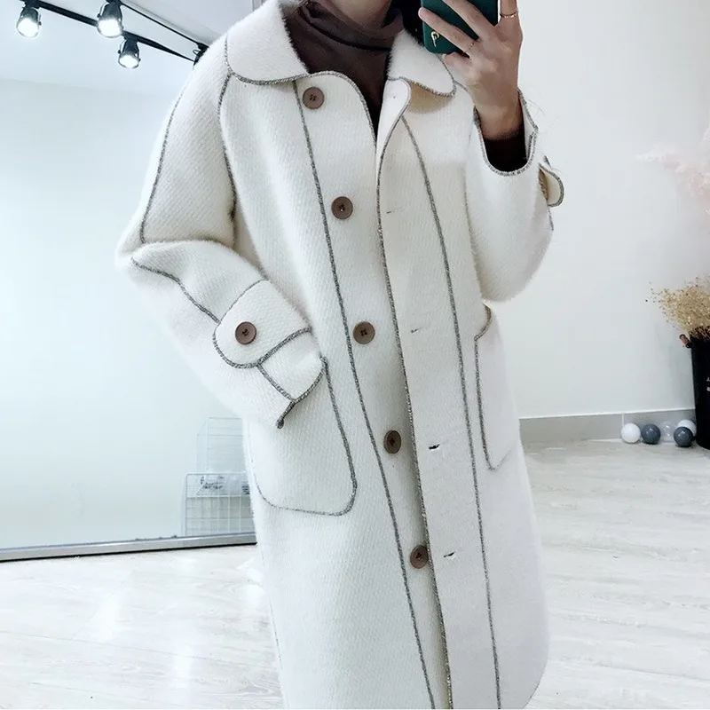 Winter new women coat Korean women's wool coat retro lamb hair in the long winter coat women lapel long sleeve coat