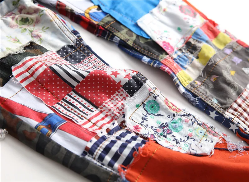 Hip hop Men's patchwork spliced ripped denim jeans Male fashion slim colored patch buttons fly straight pants