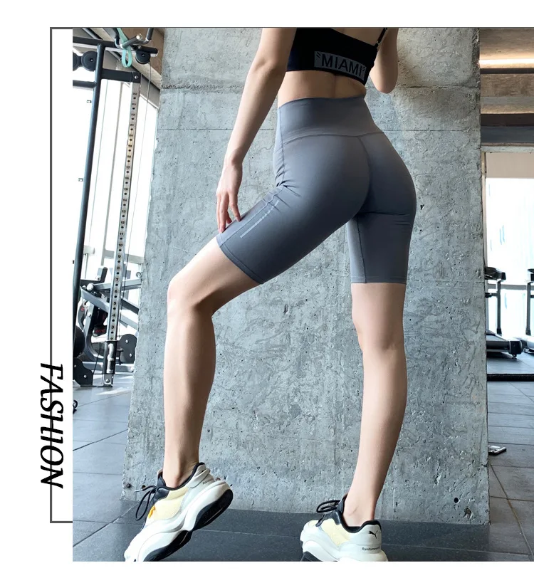 pink leggings Women Exercise half of fitness pants Europe and the United States peach carry buttock stretch tight yoga quick-drying running seasum leggings